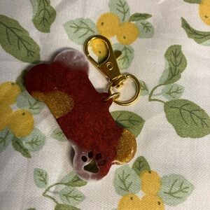 Gold and Red Keychain Accessory